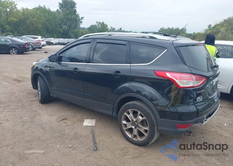 2014 Ford Escape Titanium из США, поврежденный, VIN 1FMCU9J90EUB63553